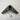 Black metal mounting bracket with a circular clamp center, shown with a small wrench and mounting screws on a plain light background.